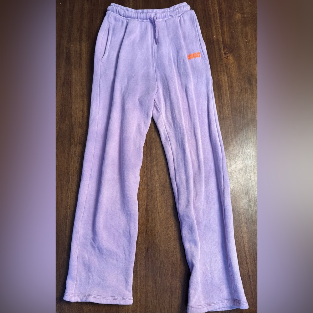 American Vintage purple with orange label